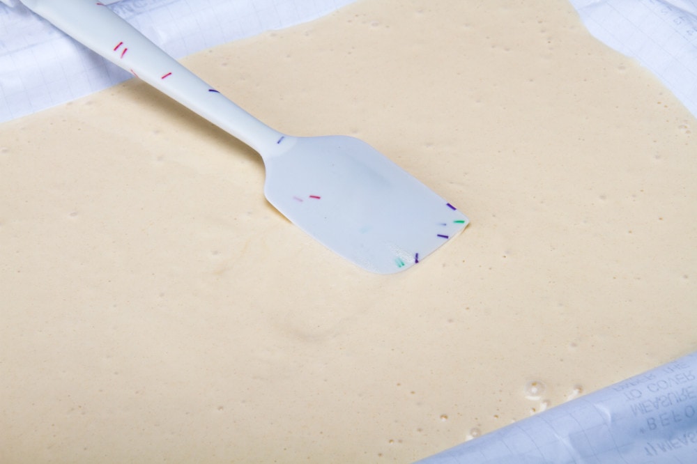 Spread the batter on the tray